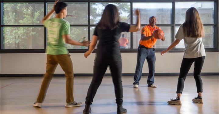 Adolescents playing ball